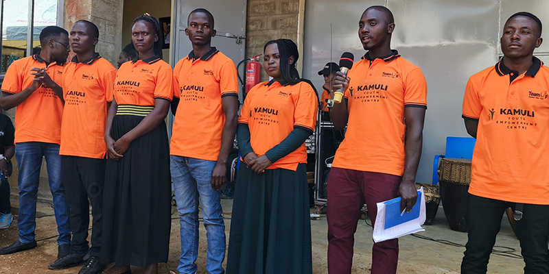 Henry Muyanja with members of the Executive Committee of Kamuli Youth Empowerment Centre